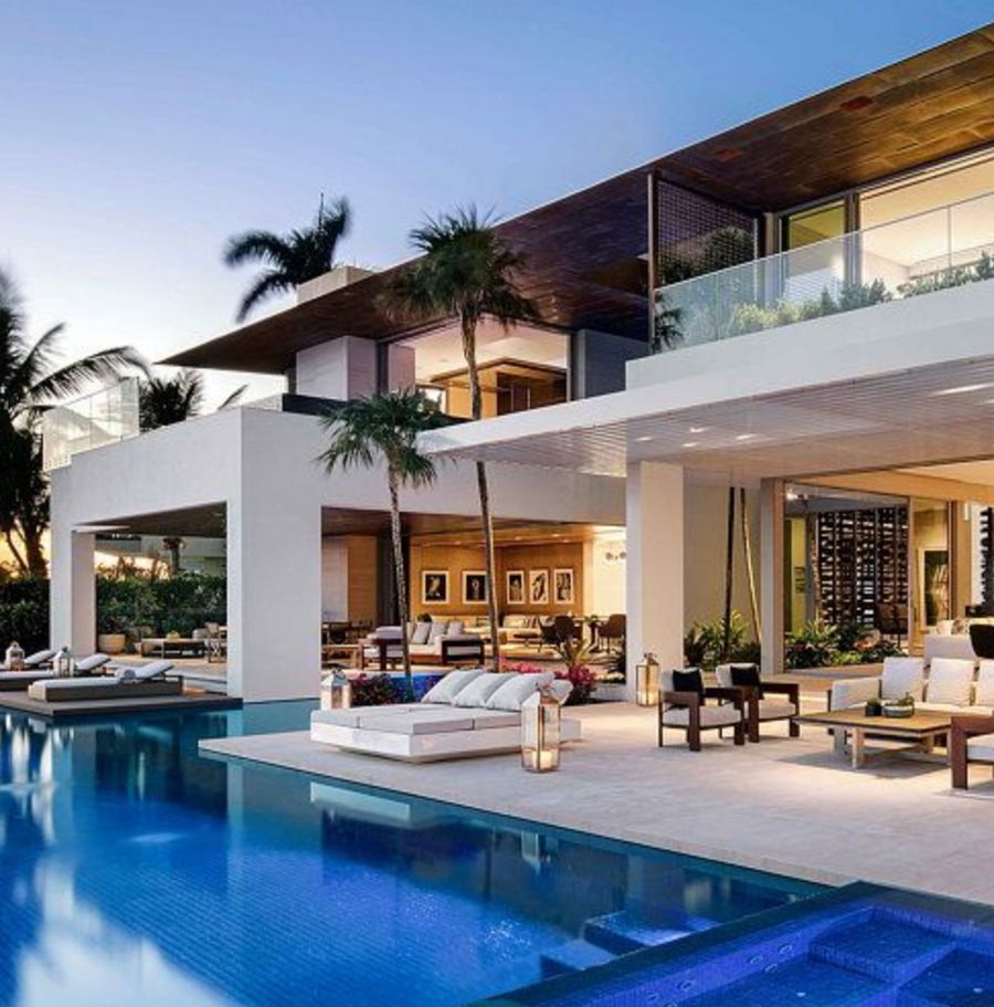 Modern waterfront home with pool